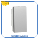 زر جرس فضي اللون من ماركة نيو يونيكا، بتصميم عصري وأنيق.